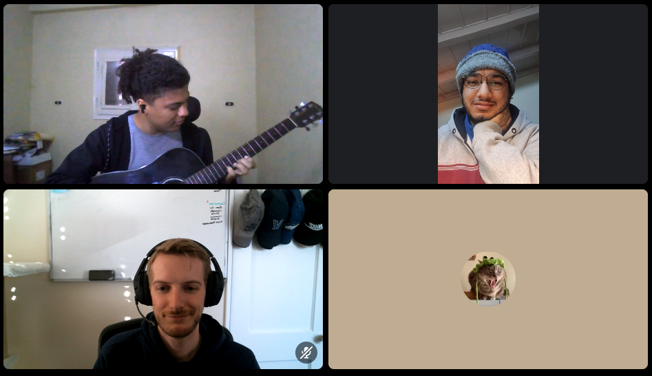 Screenshot of four folks on a video call the one playing guitar
