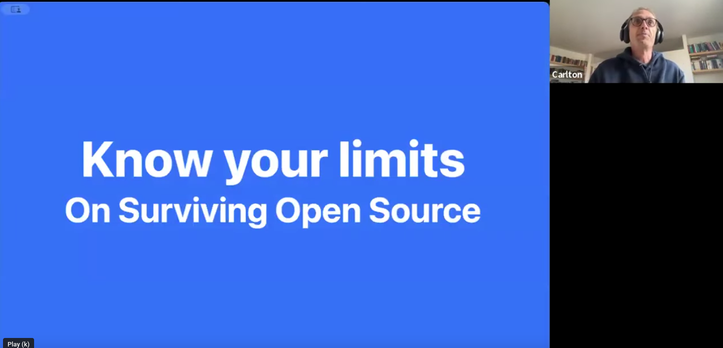 A screenshot of a video call with a presenter on screen, "Know your limits, on surviving open source"